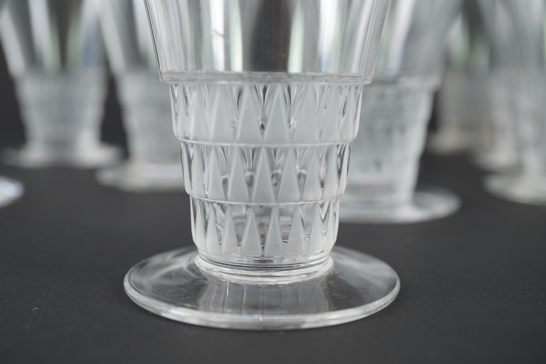 Lalique: A suite of 'Bourgueil' pattern drinking glasses